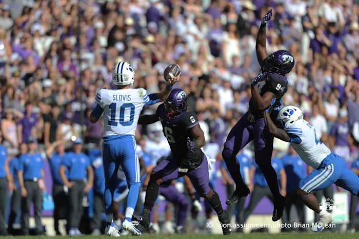 TCU's defense blocks a pass by BYU's Kedon Slovis